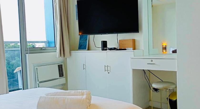 1BR in Azure Beach Resort- JL Residences photo