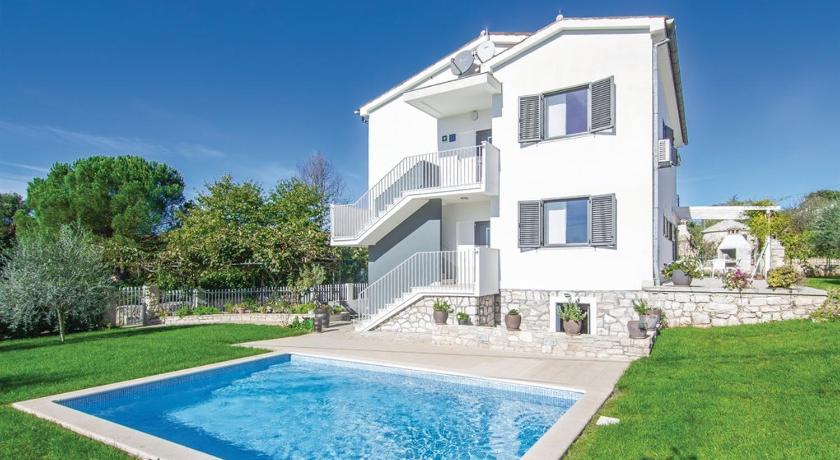 Apartments with a swimming pool Fiorini, Novigrad - 7047 — Hotel in Novigrad