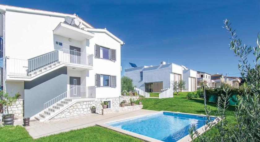 Apartments with a swimming pool Fiorini, Novigrad - 7047 photo