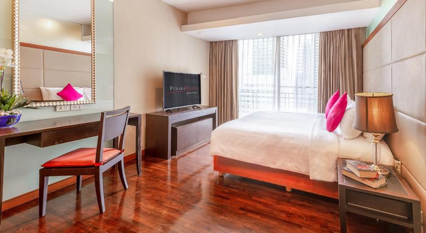 a bedroom with a bed, desk, chair and a lamp, FuramaXclusive Sathorn Hotel Bangkok  (SHA Extra Plus) in Bangkok