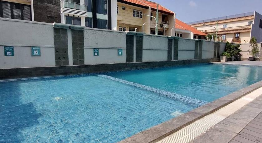 Apt Amethyst Tower Studio dgn Kolam Renang dan Netflix photo