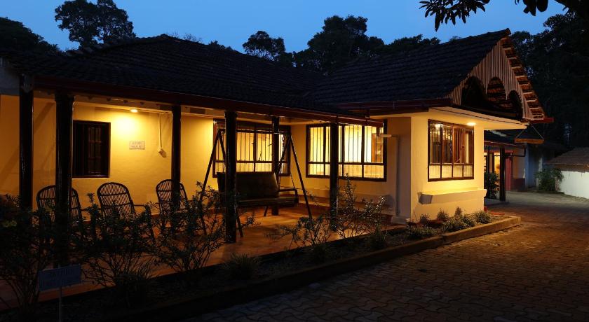 a house with a porch and a window, Avadale Coorg in Coorg
