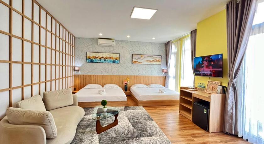 a living room filled with furniture and a tv, HANZ VeniceRiver Power MIA Grand World in Phu Quoc Island