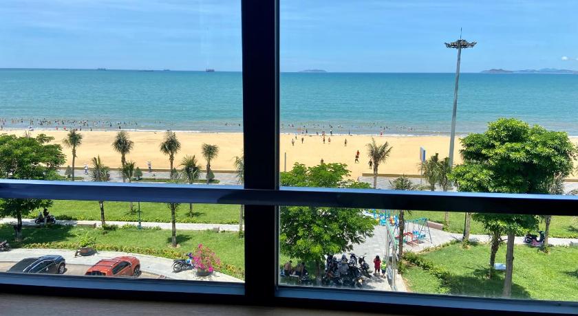 a view from a balcony of a beach with a view of the ocean, Thien Hai 2 Hotel in Quy Nhơn (Bình Định)