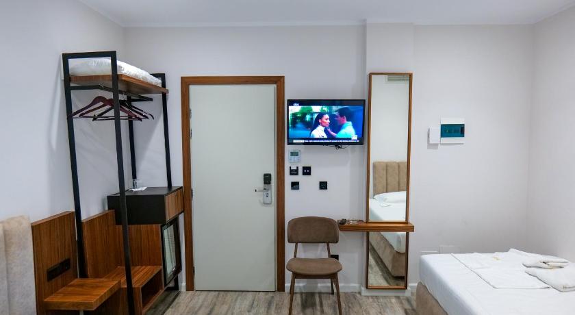 Foto, millel on kujutatud Kolmeinimesetuba rõduga (Triple Room with Balcony) 9