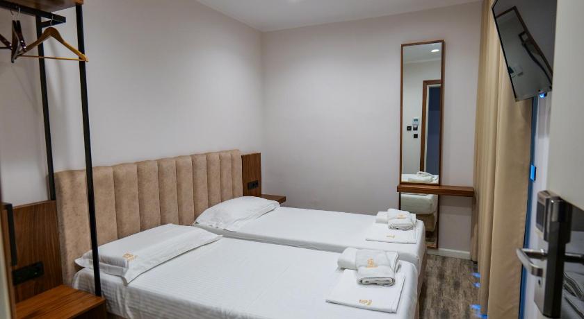 Foto, millel on kujutatud Kaheinimesetuba (double) rõduga (Double Room with Balcony) 10