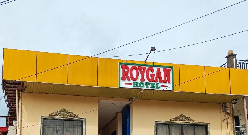 a building with a neon sign on the side of it, RedDoorz @ Roygan Hotel Kidapawan City in Kidapawan City