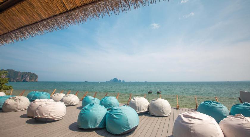 a beach area with chairs and umbrellas, Panan Krabi Resort (SHA Extra Plus) in Krabi