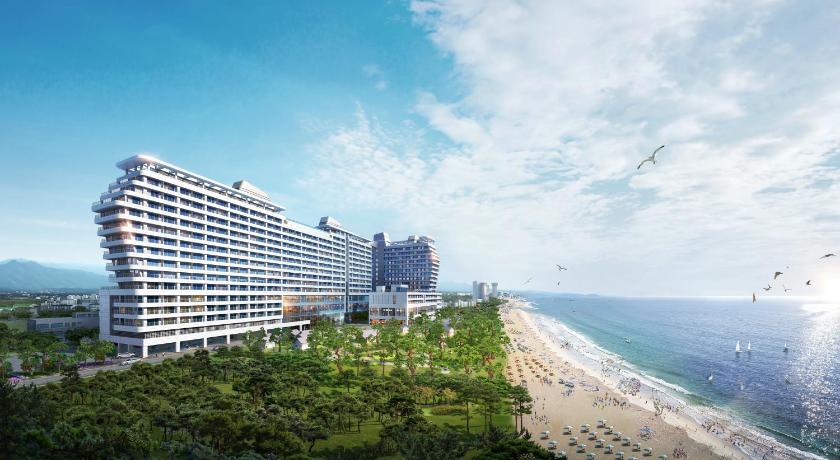 a large building with a view of the ocean, St.John's Hotel in Gangneung-si