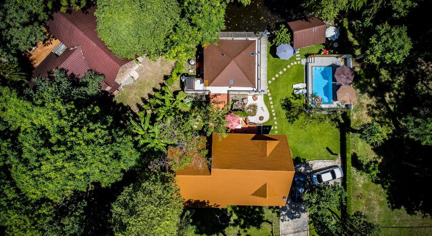 รูปของบ้านพัก 4 ห้องนอน (Four-Bedroom House) 0