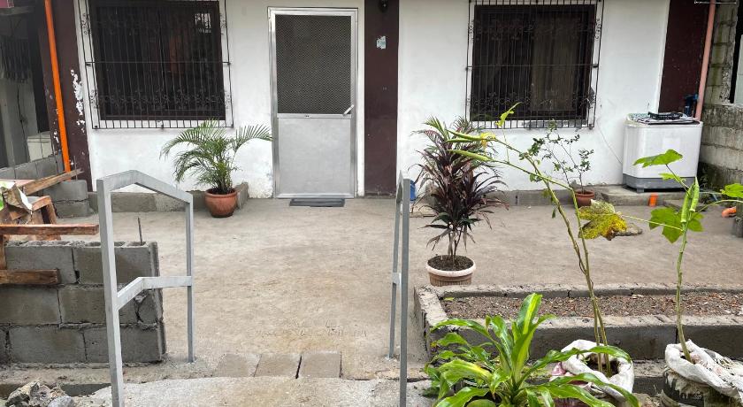 a garden area with a toilet and a sink, Maria's house nearby Victory Town Center. in San Jose del Monte