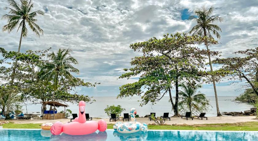 a pink swimming pool with a pink chair in the middle of it, Shantaa Resort, Kohkood SHA Plus B4140 in Koh Kood