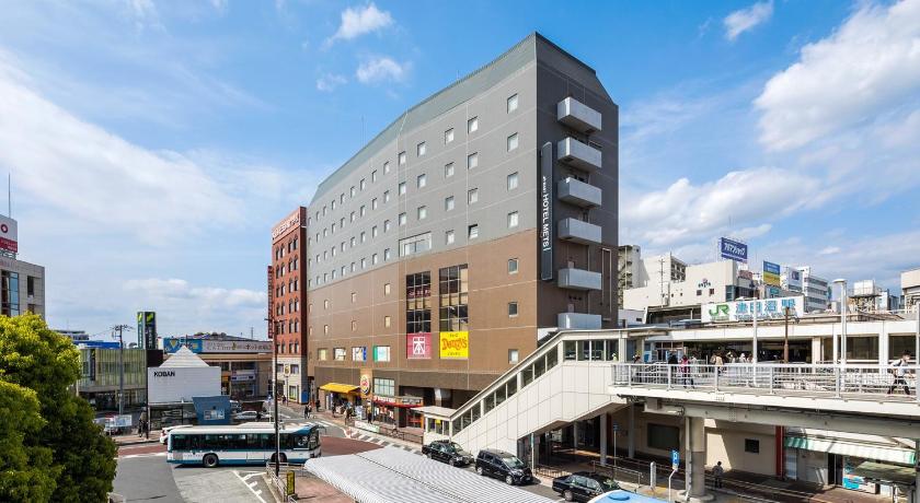 a city street filled with lots of buildings, JR-EAST HOTEL METS TSUDANUMA in Funabashi