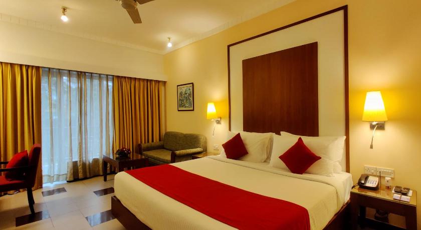 Image of Deluxe King with 20% off on Session on Spa , Food & Beverages and complimentary Access to Water Park Rides 1