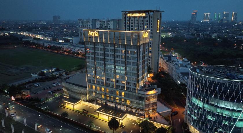 a city with tall buildings and a clock tower, Atria Hotel Gading Serpong in Tangerang
