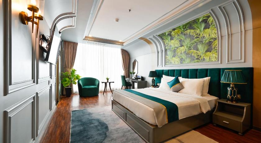 a bedroom with a large bed and a large window, Cicilia Saigon Hotels & Spa in Ho Chi Minh City