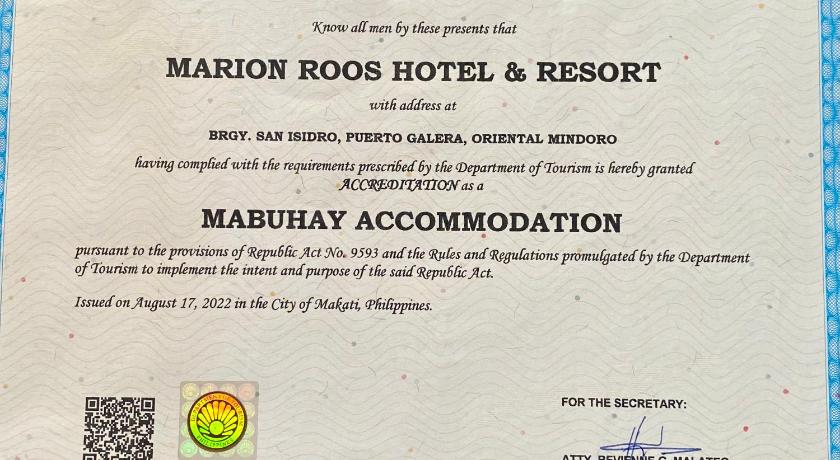 a newspaper with a picture of a bird on it, Marion Roos Hotel in Puerto Galera