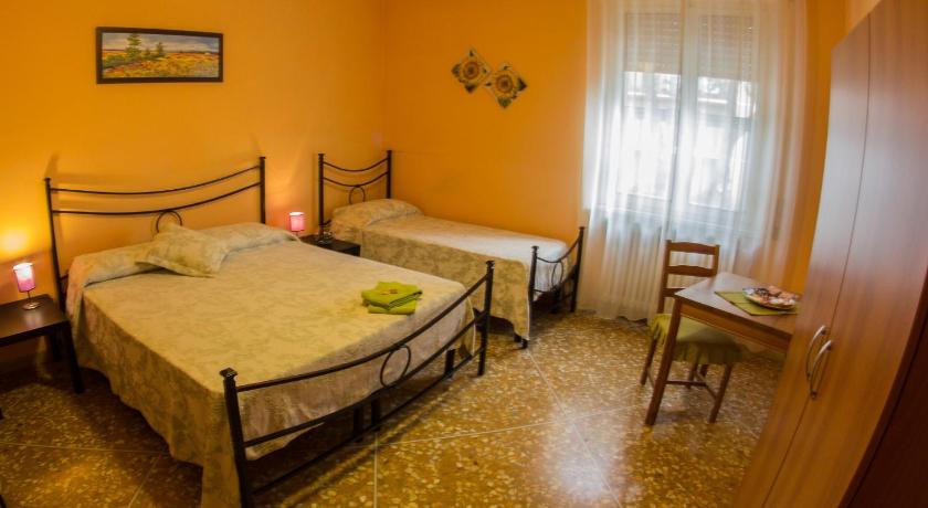 Image of Triple Room with Shared Bathroom 0