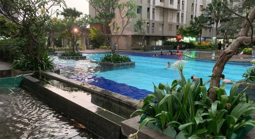 Bright cozy studio 1BR Cityview, SmartTV,FAST Wifi at Greenbay Pluit photo