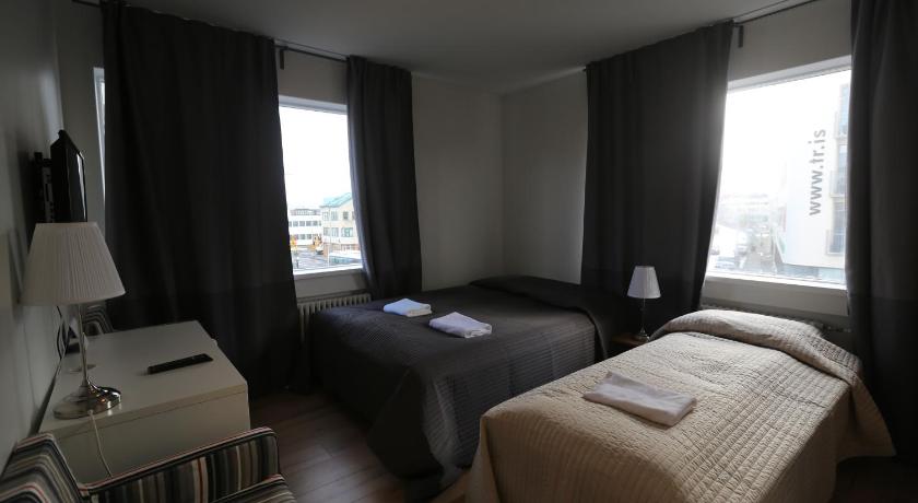 Image of Triple Room with Private Bathroom 0