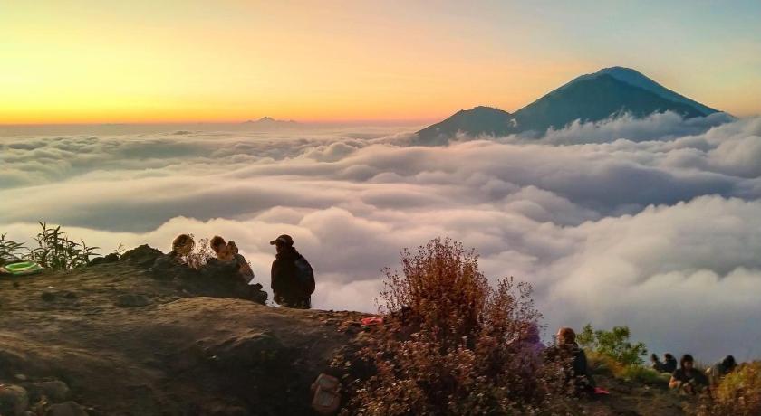 people standing on top of a hill, Volcano Valley in Bali