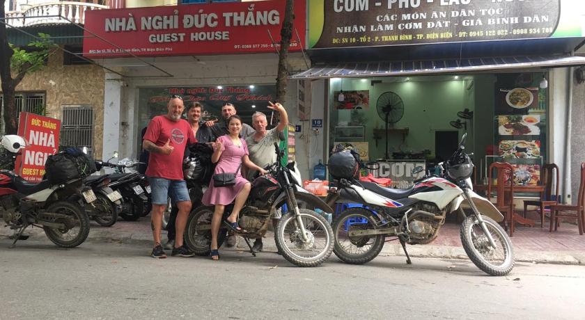motorcycles are parked in front of a restaurant, Duc Thang Guest House in Dien Bien Phu