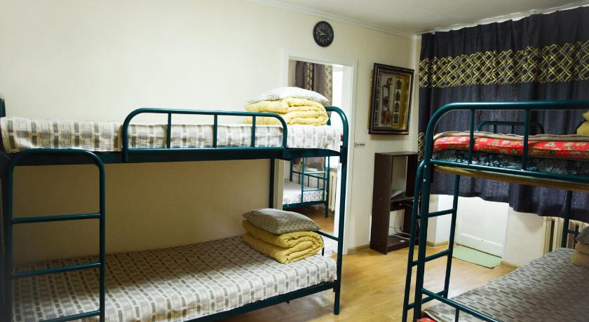 two bunk beds in a small room, UB Guesthouse in Ulaanbaatar