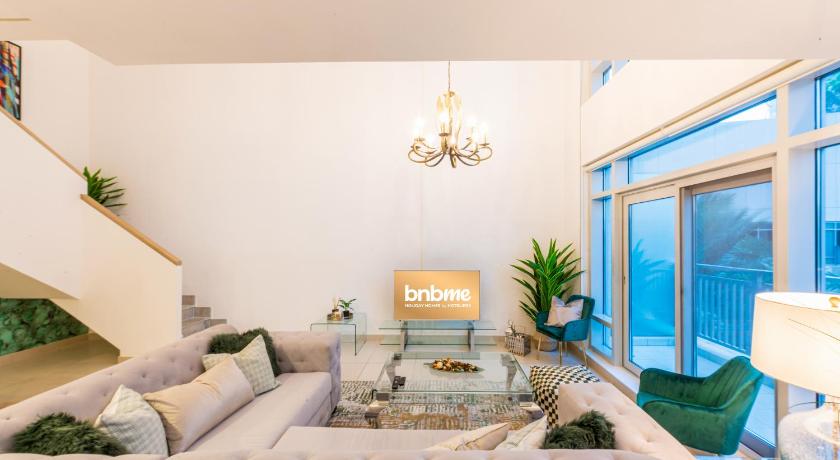 bnbmehomes - Duplex Living walk to Burj K and Dubai Mall - L313 photo