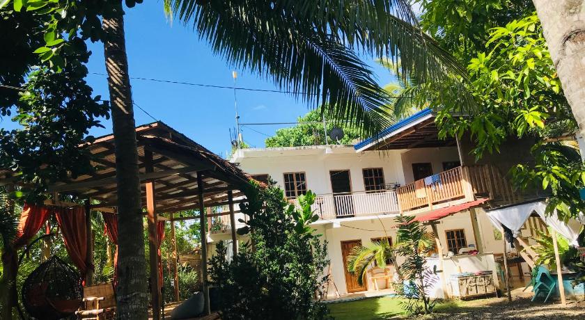 a house with trees and a building, Gon Tourist Inn in Bohol