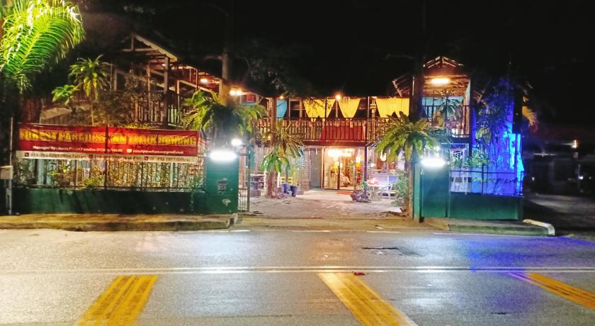 a city street at night with lights on, FOREST PARADISE INN TELUK BAHANG in Penang