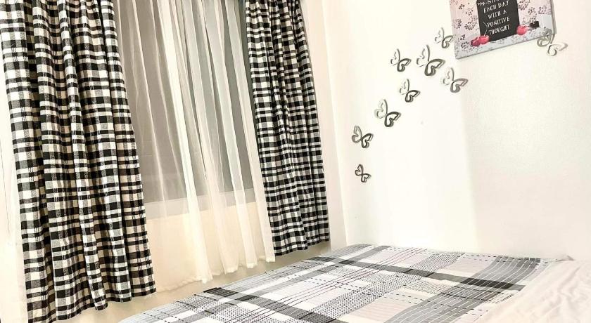 Cozy Condo For Rent at Wind Residences photo