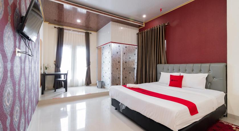 OYO 1648 Penginapan Three Joye photo