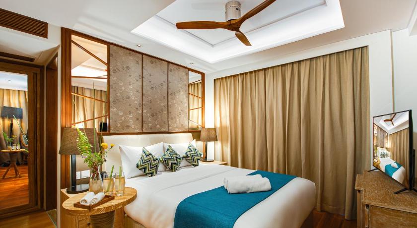 a bedroom with a large bed and a large window, Seasalter Maldives in Male City and Airport