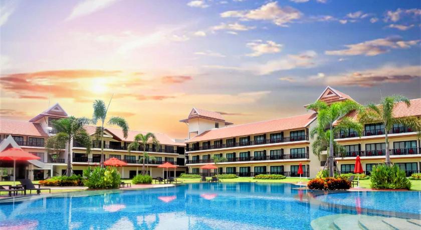 a large swimming pool with a blue sky, Tmark Resort Vang Vieng in Vang Vieng