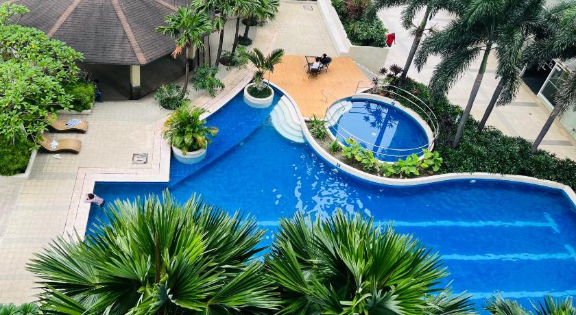 1BR Cozy Scandinavian Retreat at Ridgewood near BGC, SM Aura, McKinley Hill photo
