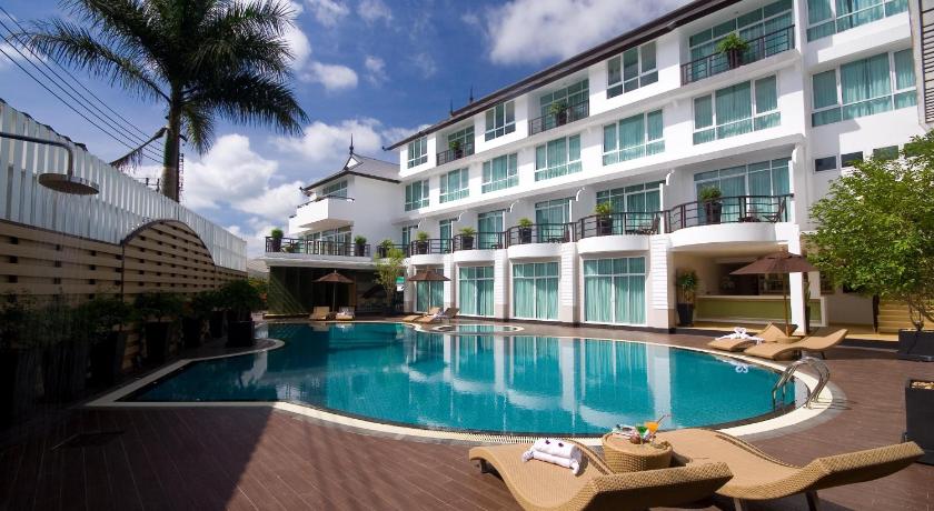 a hotel room with a pool and a balcony, A-Te Hotel Chumphon in Chumphon