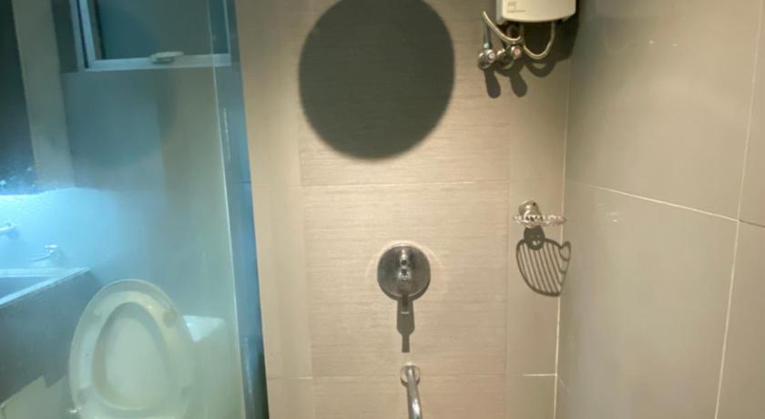 Comfy and Cozy 2BR Condo in BGC with WiFi and Netflix photo
