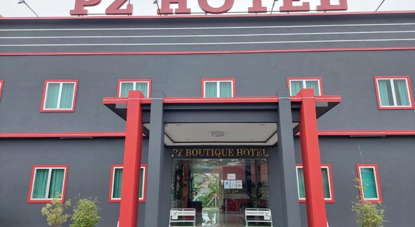 a building with a sign on the front of it, Pz Hotel in Kuala Kangsar