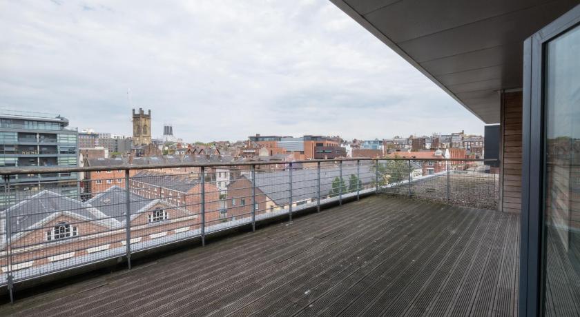 a large building with a view of the water, BOOK A BASE Apartments - Duke Street in Liverpool