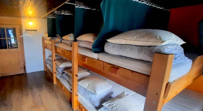 Image of Single Bed in Female Dormitory Room 0