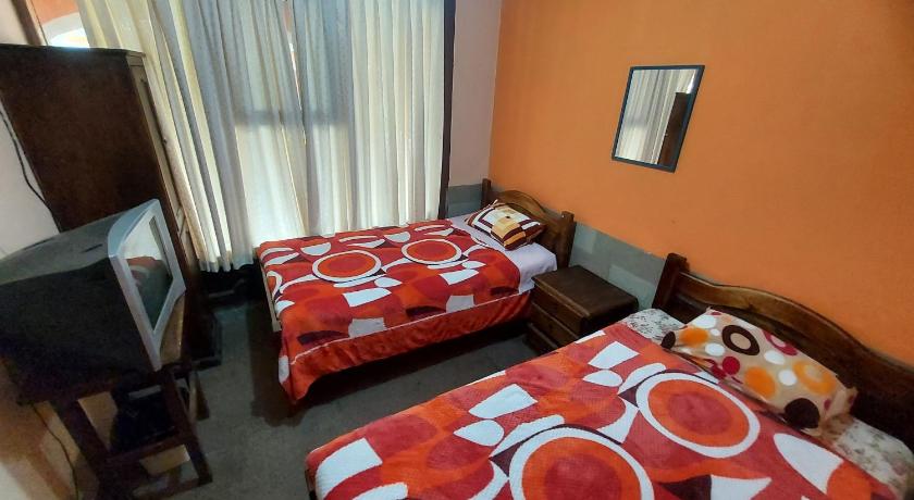 Imagem de Quarto com 2 Camas de Solteiro e Vista do Jardim (Twin Room with Garden View) 0