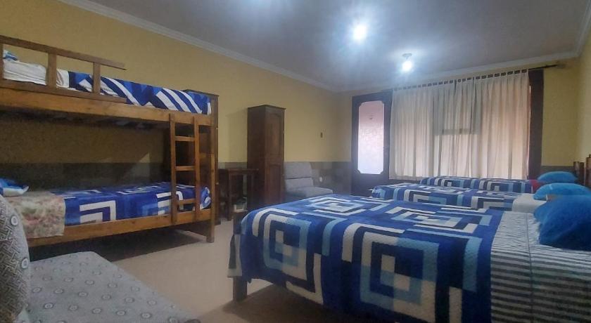 Imagem de Quarto Quádruplo com Vista do Jardim (Quadruple Room with Garden View) 0