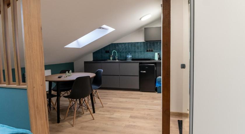 Uroczy, przytulny apartament poddasze