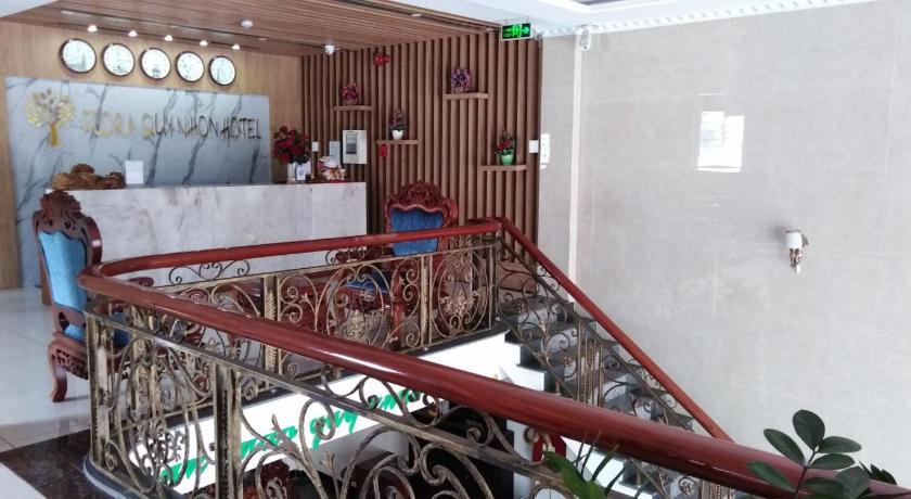 a large staircase leading to a room with a train on it, Flora Quy Nhon Hotel in Quy Nhon (Binh Dinh)