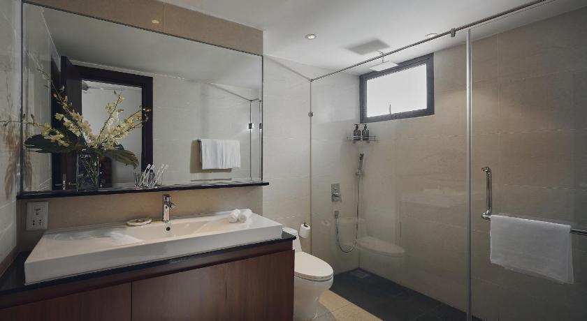a bathroom with a shower, sink, and toilet, TRILLION SUITES by SLG in Kuala Lumpur