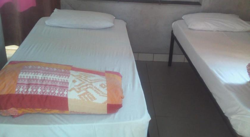 two beds in a small room, Accoustix Backpackers Hostel in Johannesburg