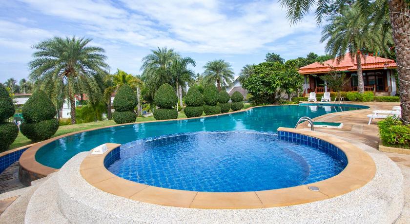 a swimming pool with a pool table and chairs, Lanta Lapaya Resort (SHA Extra Plus) in Koh Lanta