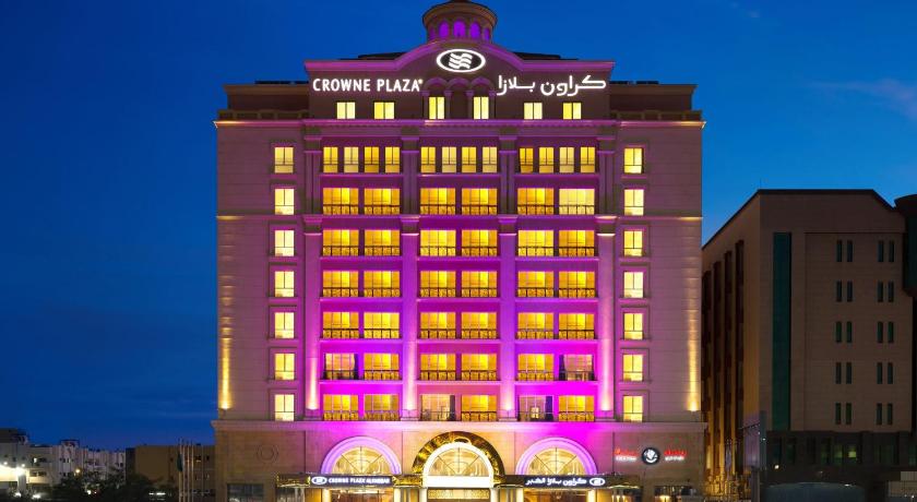 a large building with a clock on the front of it, Crowne Plaza Al Khobar in Al-Khobar