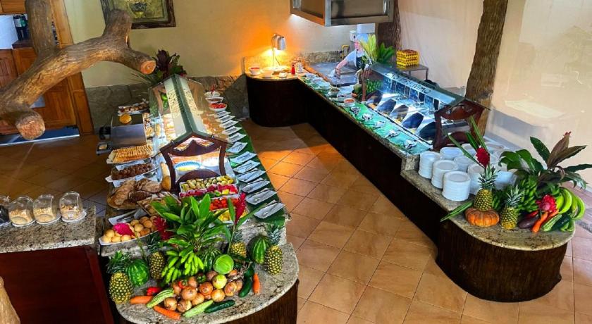 a table topped with lots of different types of food, Los Lagos Spa & Thermal Resort Experience in La Fortuna