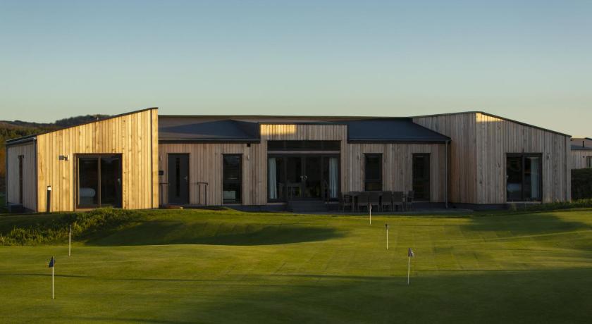 a large building with a large window in the middle of it, Dundonald Links in Irvine